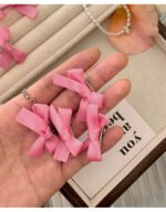 8 Pink Ribbon Bow Hair Clips On The Forehead - Image 10
