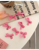 8 Pink Ribbon Bow Hair Clips On The Forehead - Image 7